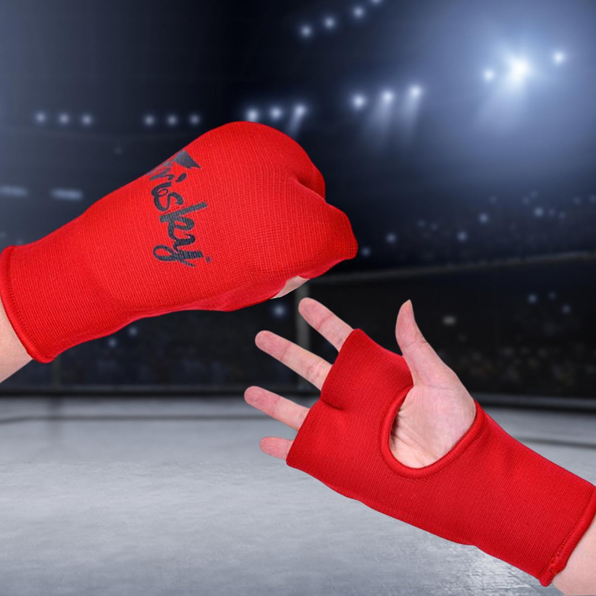 Red boxing inner hand mitts for boxing training.